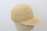 Load image into Gallery viewer, Grosgrain natural straw cap on a mannequin head against a plain background

