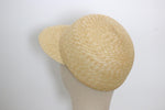 Load image into Gallery viewer, Grosgrain natural straw cap on a mannequin head against a plain background
