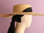 Load image into Gallery viewer, Grosgrain Amal the wide-brimmed natural straw boater hat with chin strap ribbons
