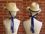 Muat gambar ke penampil Galeri, Natural Straw Trilby with a long ribbon with tassels Jean Tassels
