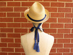 Load image into Gallery viewer, Natural Straw Trilby with a long ribbon with tassels Jean Tassels
